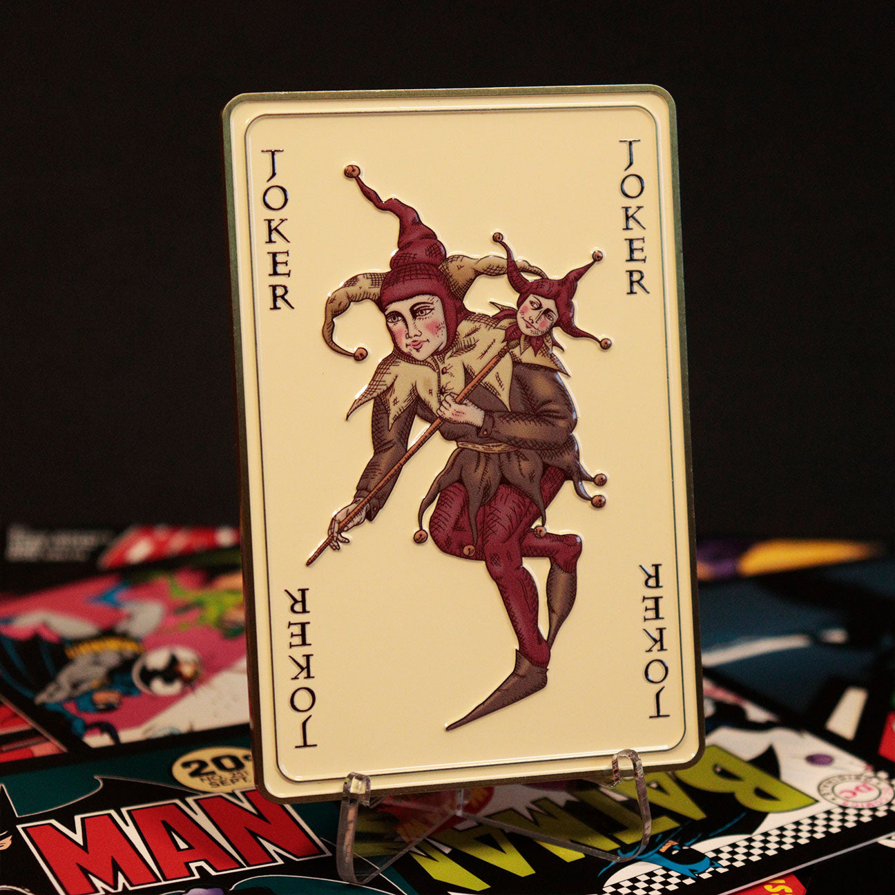 The Dark Knight Trilogy Limited Edition Joker Calling Card Ingot Lifestyle Shot with Stand 