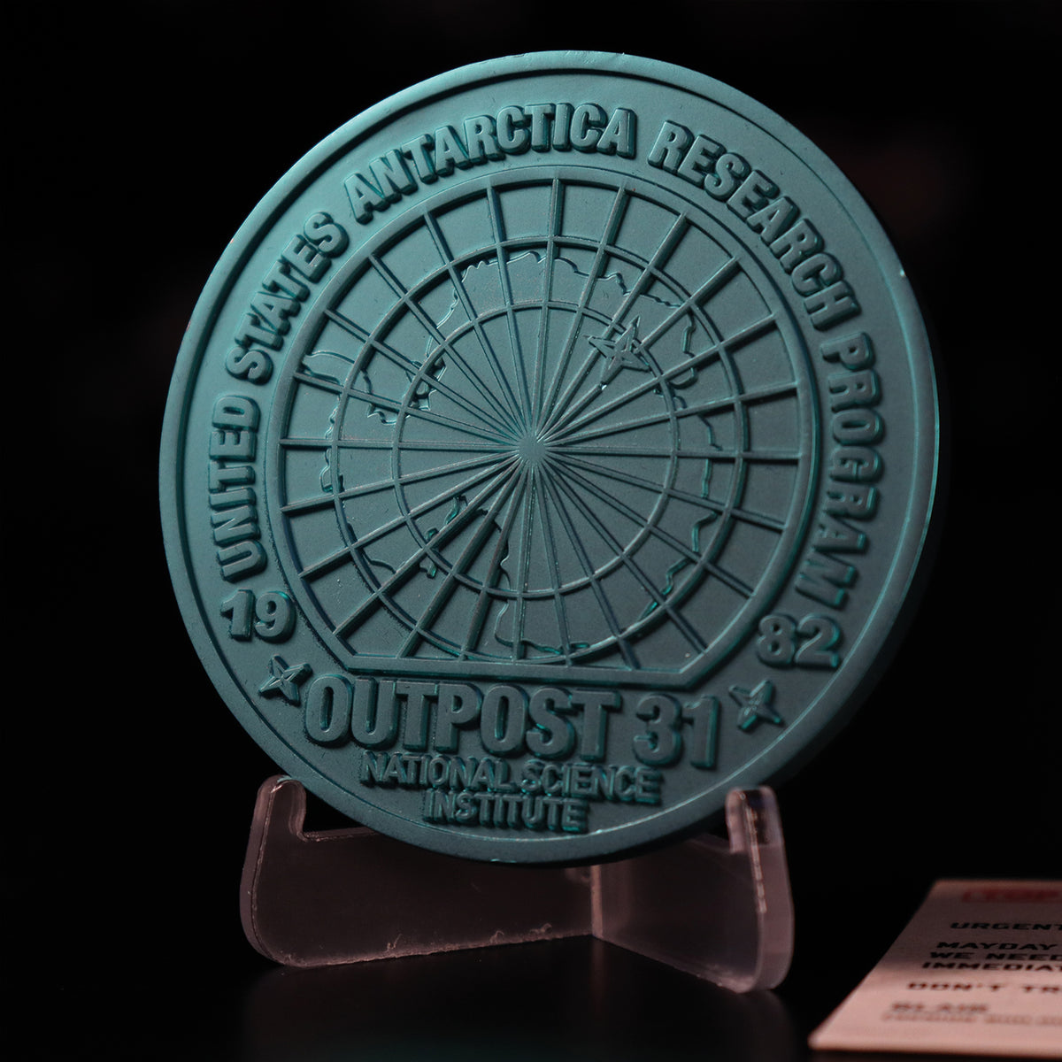 The Thing limited edition Outpost 31 metal medallion and display stand