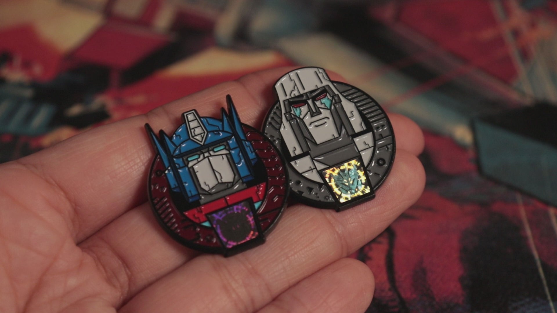Holographic stickers on the Transformers Pin Badges